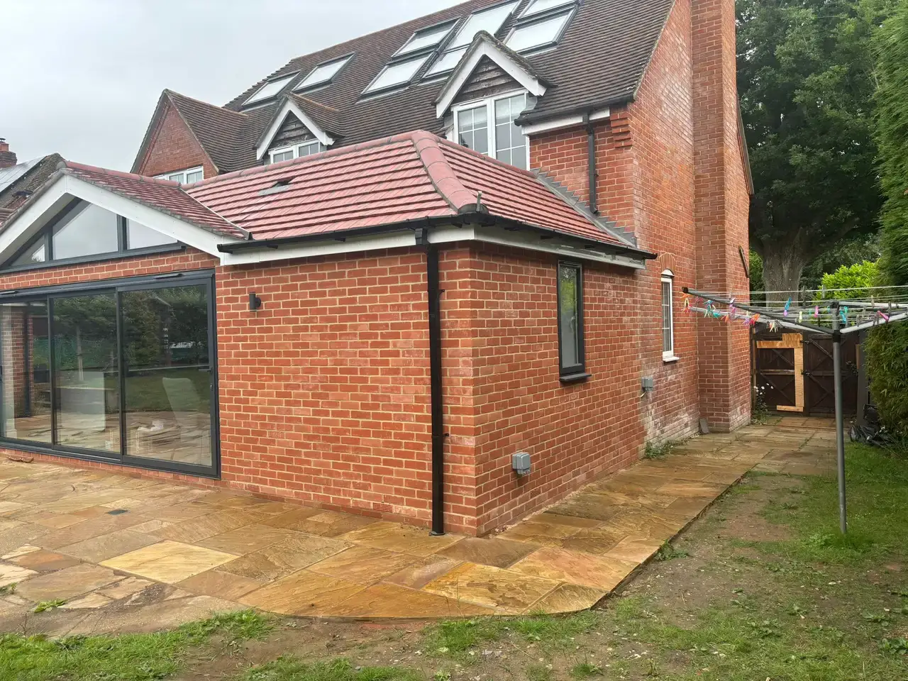 Loft conversion underway — roof opened and beams installed